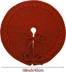 Detail of red cable knit Christmas tree skirt with ties and 18 inch size marking