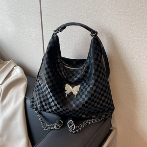 Black checkerboard hobo bag with silver butterfly buckle and metal chain strap