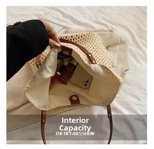 Spacious interior of woven tote bag with brown leather trim and magnetic closure