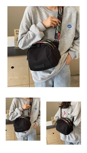 Black canvas crossbody shell bag with stylish wide bohemian floral embroidery strap
