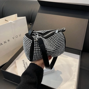 Sparkling rhinestone cylinder crossbody bag with black leather strap in a premium gift box