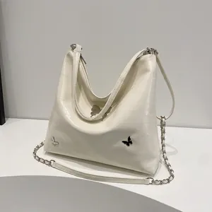 Borsa a Tracolla in Pelle PU Con Decorazione a Farfalla Metallica per Donna Grande Capacità Design di Nicchia Pendolare Zaino Multiuso