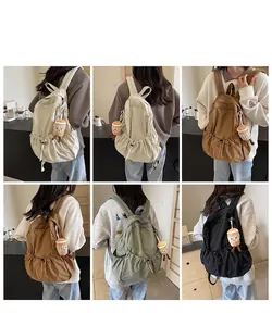 Detail shots of versatile nylon backpacks in multiple colors with plush charms