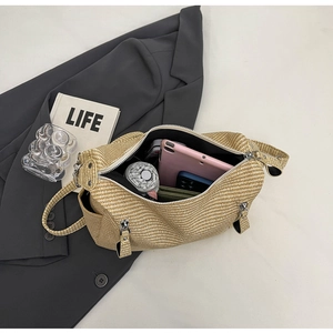 Detail view of large woven tote bag interior showing space for tablet and essentials
