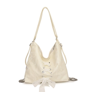 Cream tote bag with marble texture, white lace cross straps and bow decoration