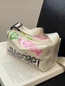 Transparent PVC square crossbody bag with green '8' graffiti and wide strap