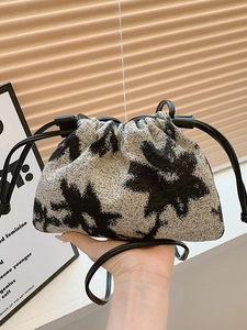 Chic oil painting style bucket bag with floral print and black drawstring straps
