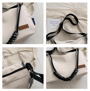 Détails du sac cabas en toile blanche avec logo en cuir KEFEIR et sangle en corde tressée