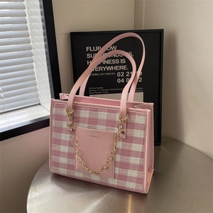 Pink checkered tote bag with gold flower chain and top handles for women