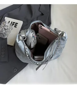 Interior view of grey denim tote bag showing spacious capacity for umbrella and tablet