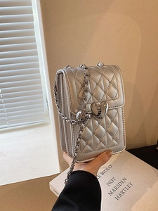 Quilted silver crossbody phone bag with heart buckle and chain strap for women