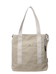 Minimalist beige canvas tote bag with contrast handles for daily commute and shopping