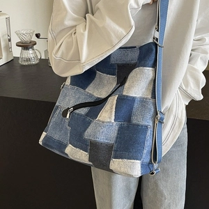 Large capacity patchwork denim tote bag with adjustable strap for shoulder or crossbody