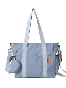 Large light blue nylon tote bag with shoulder strap and matching round coin purse