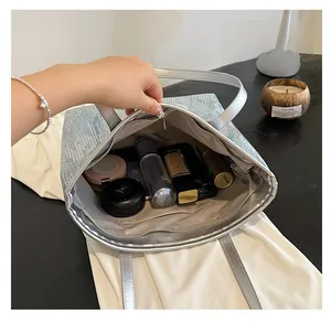 Top view showing spacious interior with zipper pocket and pockets in sequin tote bag