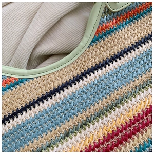 Close-up of colorful woven tote bag texture featuring vibrant multi-colored striped fibers