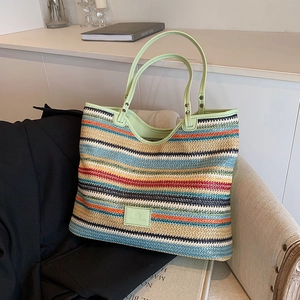 Woven straw tote bag with vibrant multi-color stripes and large capacity for summer