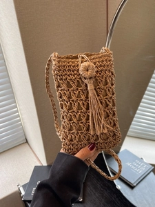 Handcrafted oatmeal woven crossbody phone bag with long fringe tassels and button detail