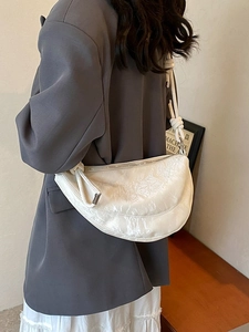 Chic off-white pleated glossy leather crescent hobo bag for women in minimalist style