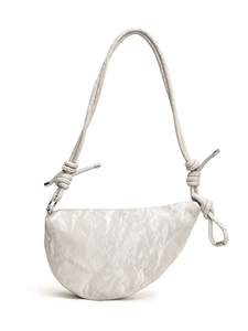 Metallic pearl white dumpling bag with unique pleated texture and knotted shoulder strap