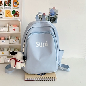 Light blue nylon backpack with cute dog pendant and SuJu logo for students