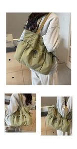 Detail van matcha groene nylon draagtas met externe zakken en zwarte trekkoorden