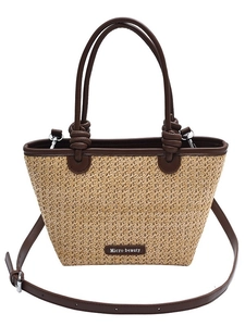 Natural straw woven bucket bag with brown leather knotted handles and adjustable strap