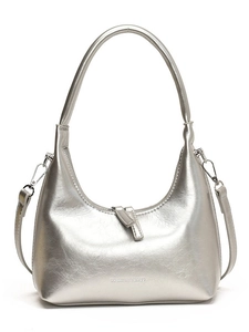 Silver metallic crescent hobo bag with top handle and detachable shoulder strap