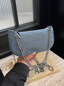 Blue denim Y2K shoulder bag with silver studs and metal chain strap for women