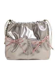 Silver metallic drawstring backpack for women with pink bows and chain strap accents