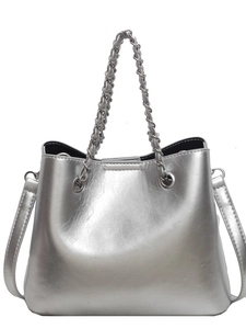 Chic silver metallic bucket bag with woven chain handle and adjustable shoulder strap