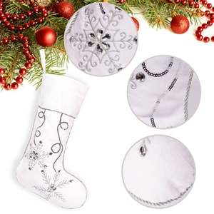 White plush Christmas stocking with silver snowflakes and sequins for festive tree decor