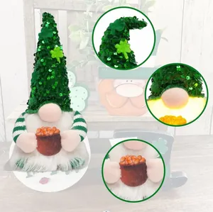 Close-up of St. Patrick's Day gnome featuring sequin hat, clover and glowing LED nose