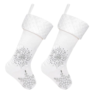 Set of two white leather Christmas stockings with silver sequin snowflakes for home decor