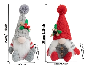 Detailed view of two Christmas gnomes with knit hats and berry accents showing 25cm height