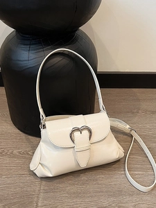 Chic white glossy PU leather underarm bag featuring a stylish silver heart metal buckle