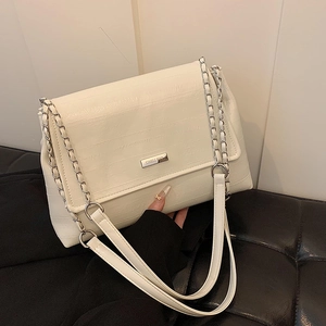 Creamy white crocodile embossed shoulder bag with silver chain strap for casual wear