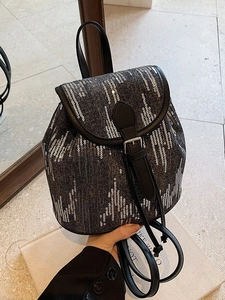 Mini sac à dos en denim avec rayures à paillettes argentées et bordures en cuir noir