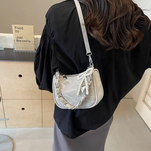 Elegant light gray faux leather shoulder bag with silver chain and pearl bow charm