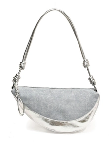 Metallic silver and denim crescent crossbody bag with stylish knot strap and Y2K aesthetic