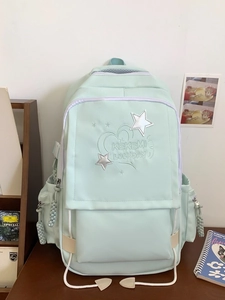 Mint green high capacity student backpack with silver star embroidery and side pockets