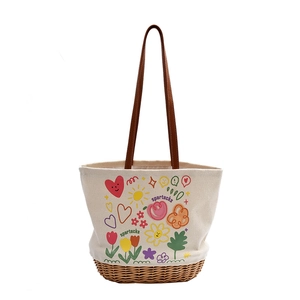 Borsa tote in tela artistica con fondo in paglia intrecciata e stampe cartoon
