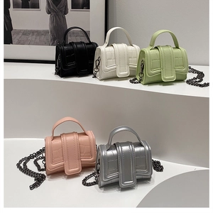 Mini embossed faux leather bags in five colors with metallic chains and top handles