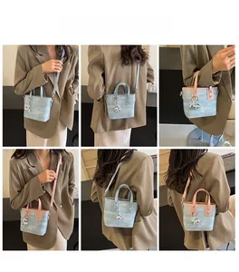 Detailed views of mini bucket bag showing handheld, shoulder and crossbody styling options