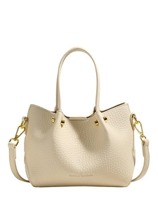 Chic cream bucket bag in lychee leather with gold hardware and crossbody strap