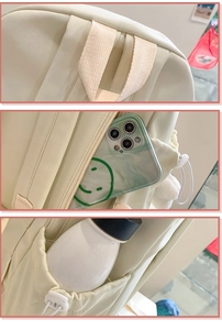 Detail view of anti-theft back pocket and side drawstring pocket on beige backpack