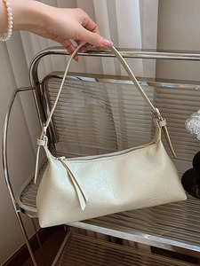 French style creamy beige baguette shoulder bag with wrinkled leather texture and metal buckle