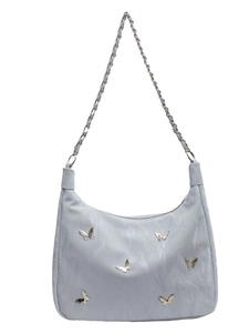 Light blue crescent shoulder bag with metallic butterfly accents and chain strap