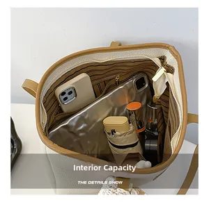 Interior view of large white tote bag showing spacious capacity for daily essentials