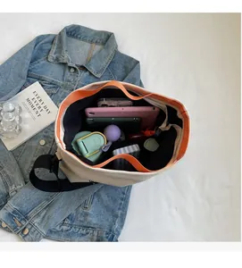 Top view of large canvas tote bag interior showing ample storage space for tablet